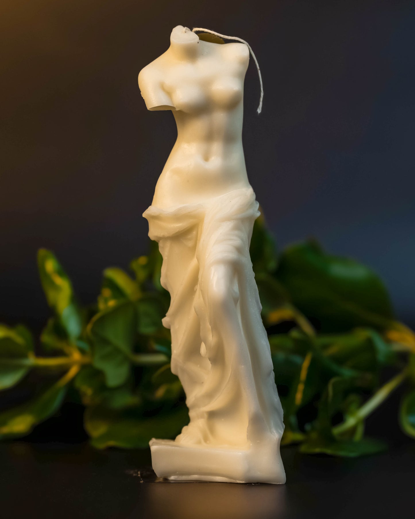 Sculpted candle embodying Aphrodite's body, radiating inspired sophistication and sensuality.