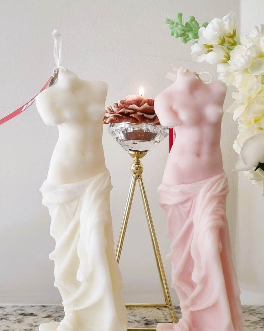 White and Pink Sculpted candle embodying Aphrodite's body, radiating inspired sophistication and sensuality.